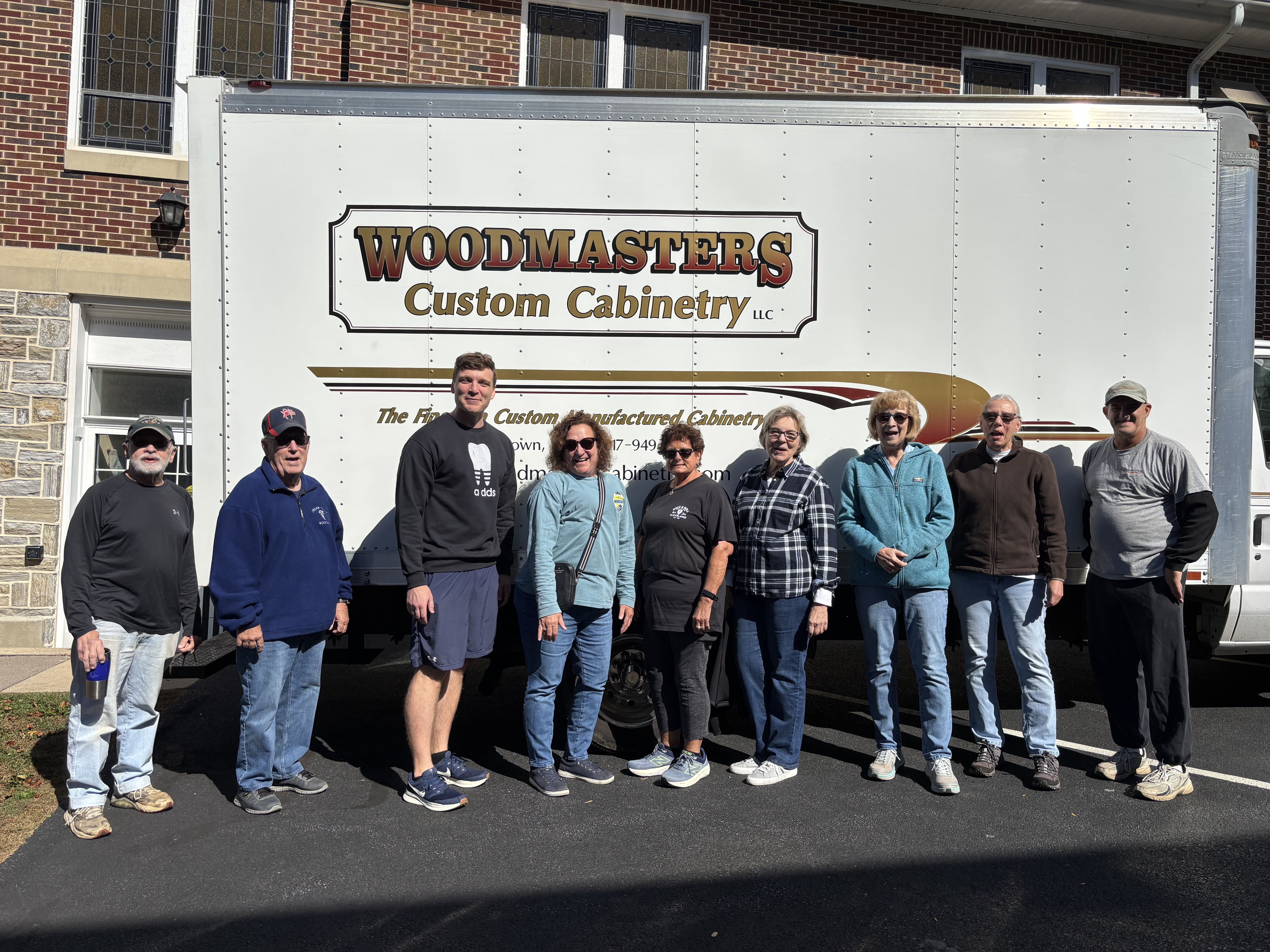 Work crew in front of truck